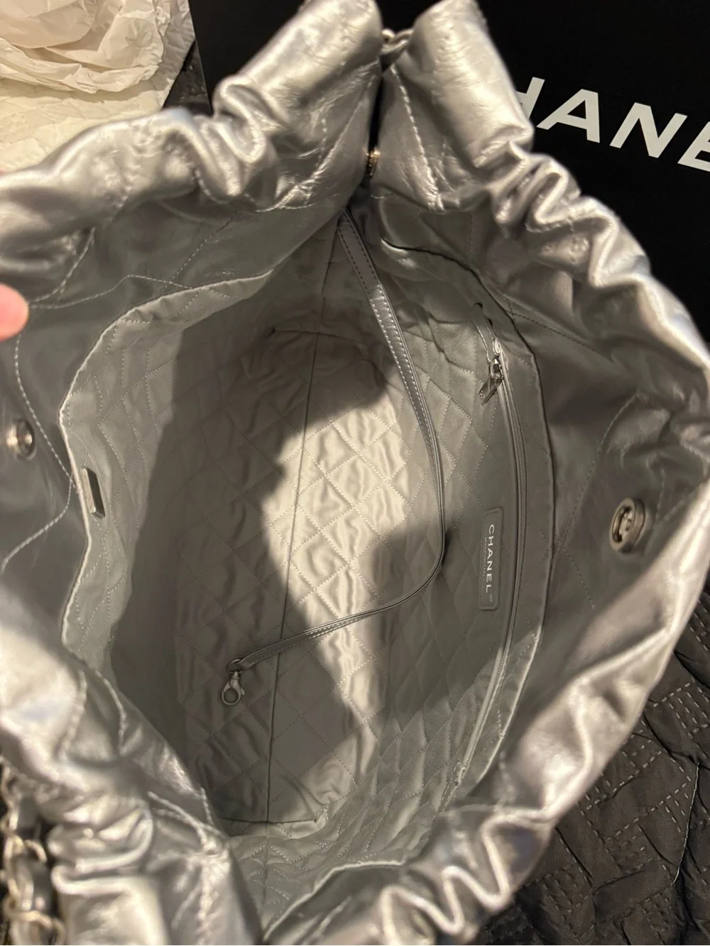 Chanel 22 in Metallic silver leather with silver hardware